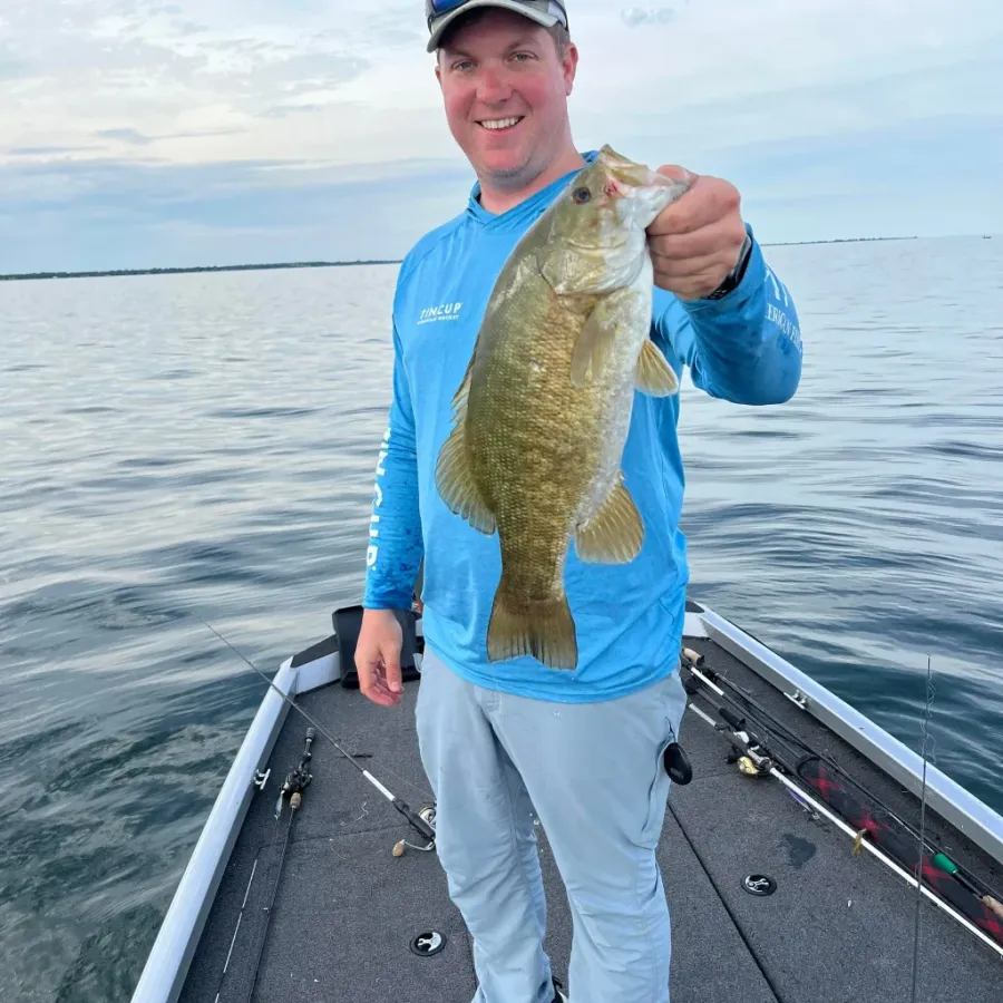 trophy sized smallmouth bass caught in open water 